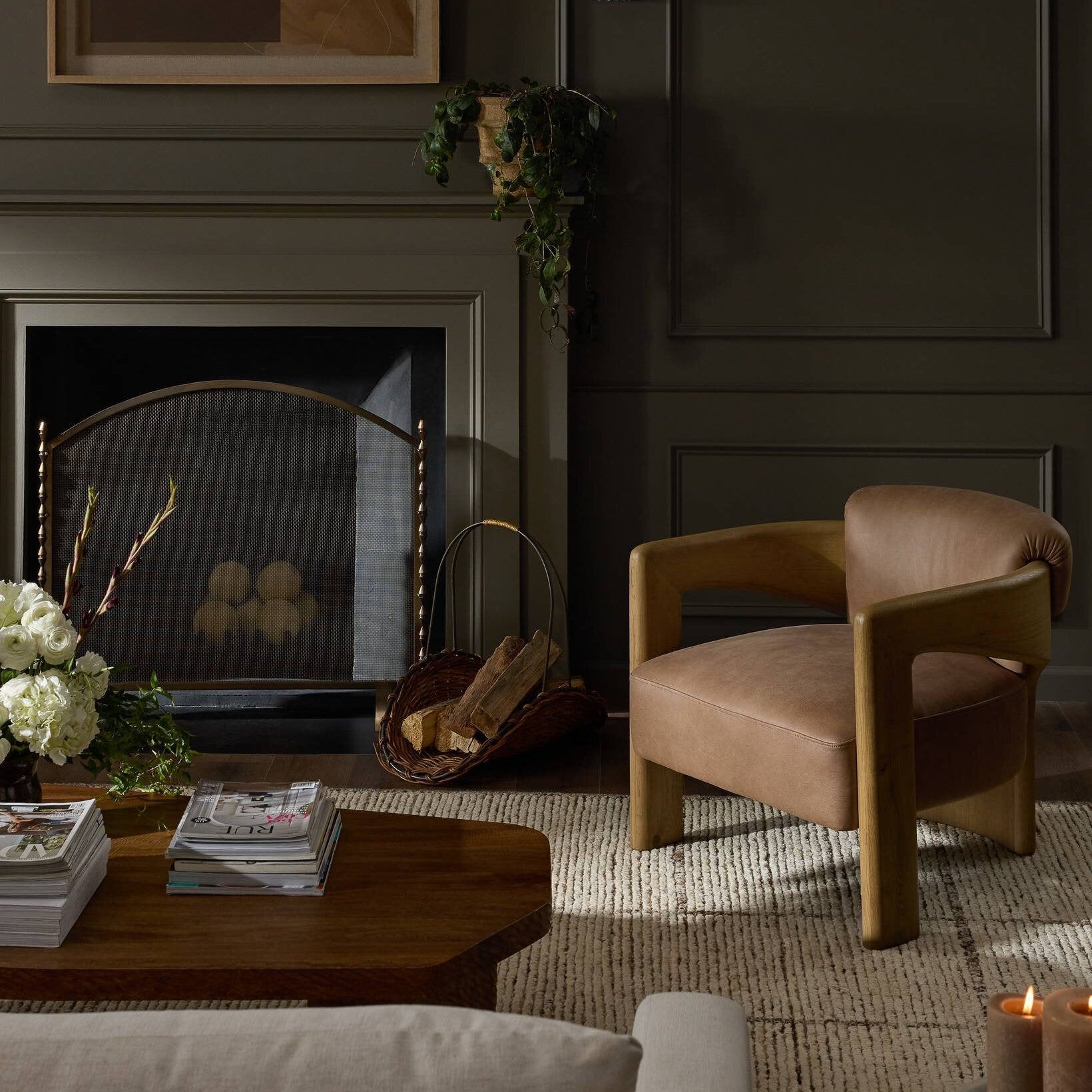 Layered living room with anchoring furniture and sculptural seating