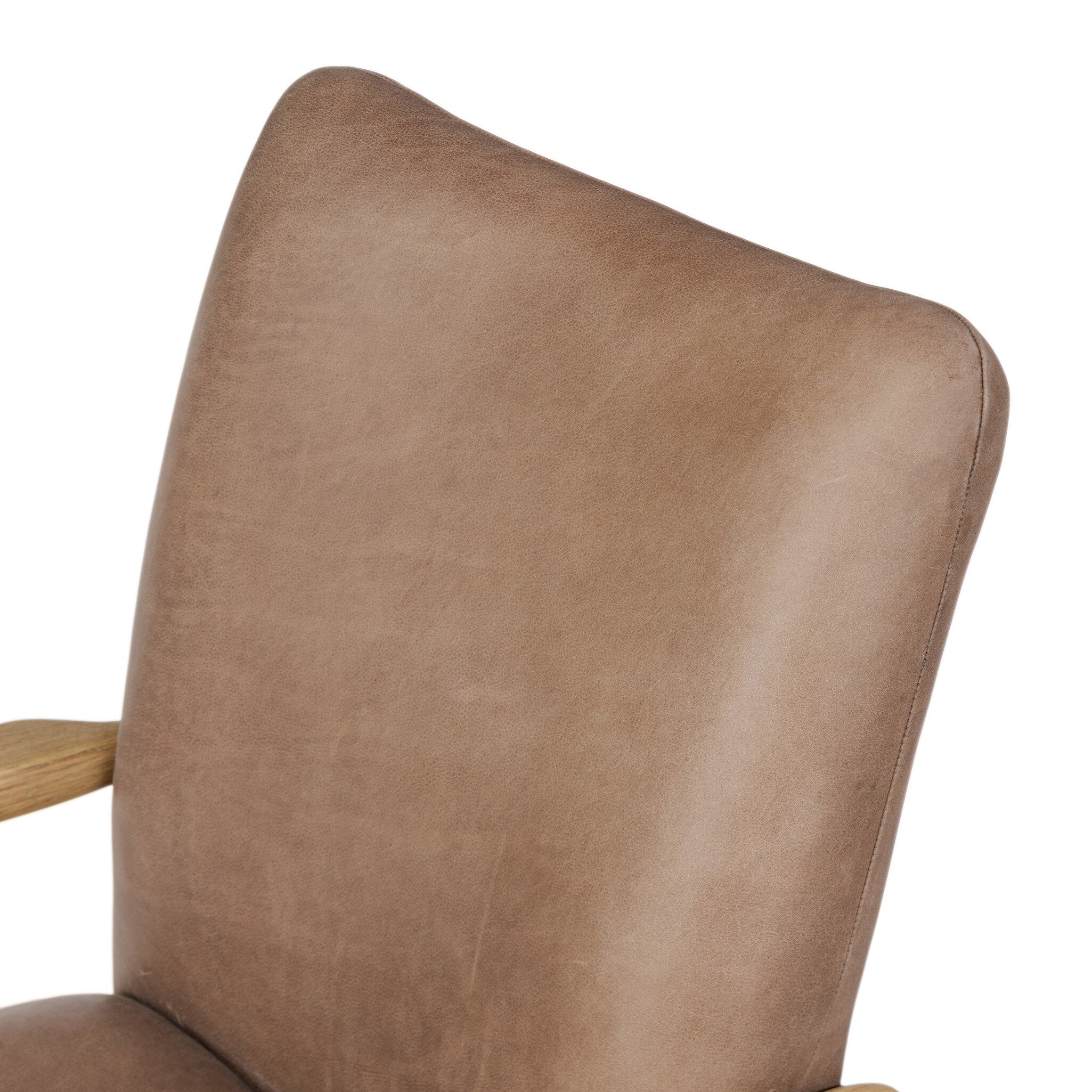 Sammy Desk Chair in top-grain leather with tufting, aged smoked oak paddle arms and brass base, 26.75W x 28.25D x 39H.