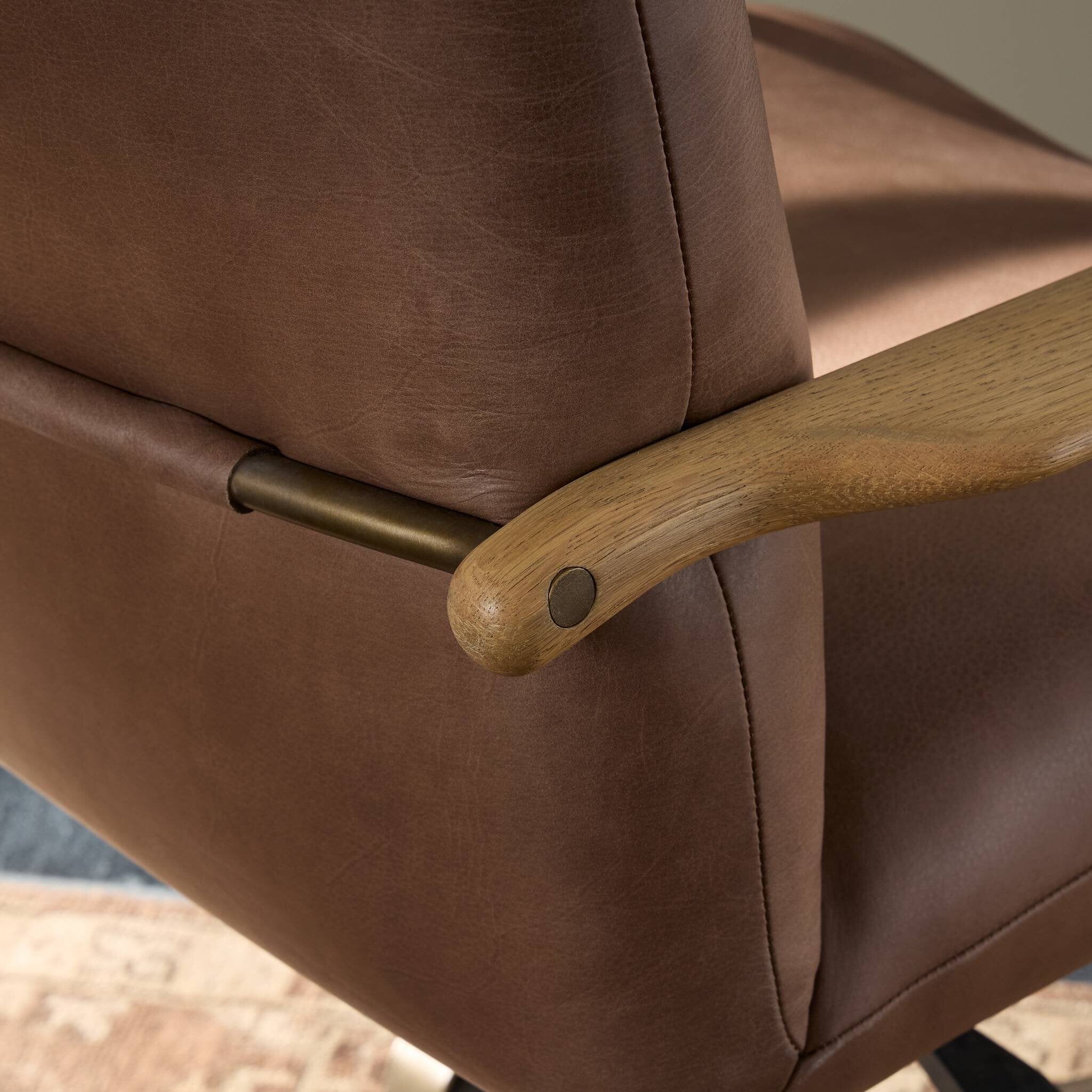 Sammy Desk Chair in brown leather with aged smoked oak paddle arms.