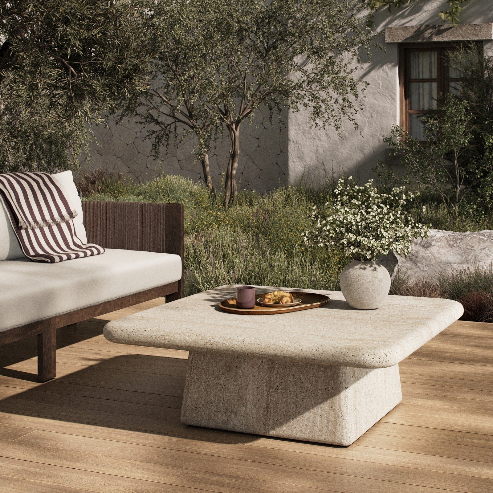 Outdoor lounge furniture arranged for summer hosting