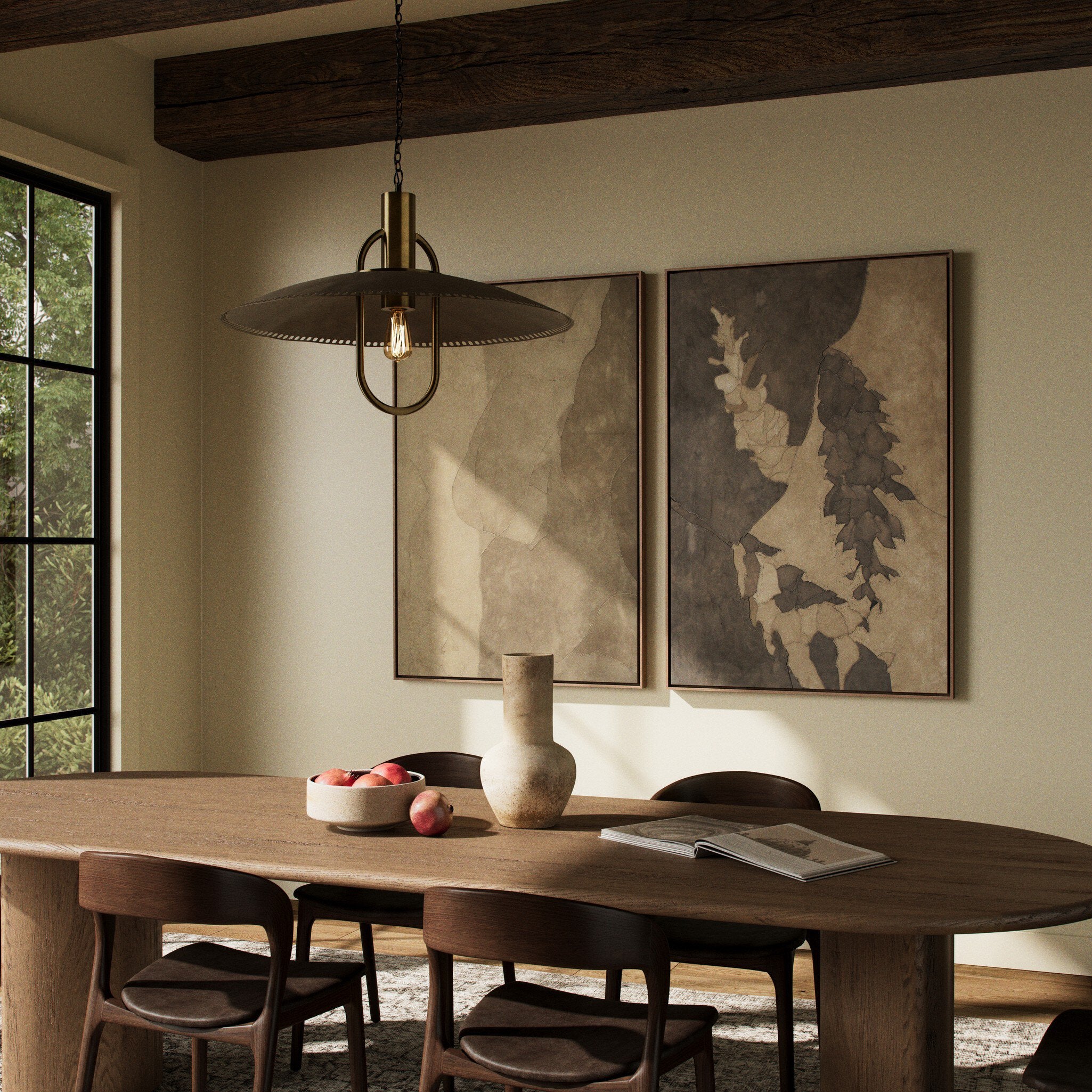 Dining room with wooden table, chairs, and wall art in a warm-toned interior.