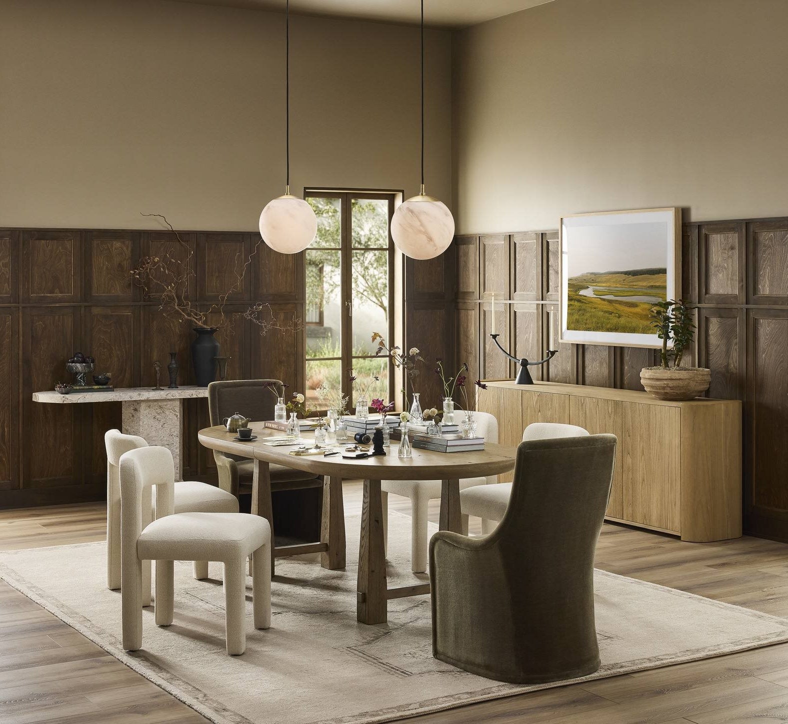 Light wood Rada Sideboard with four push-latch doors and rounded corners in a minimalist dining room.