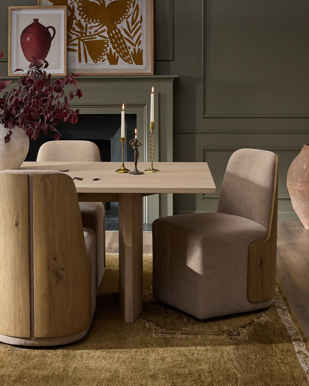 Dining room with a wood table and upholstered chairs