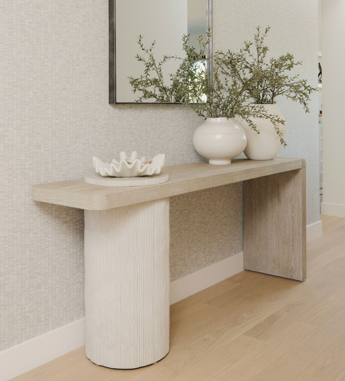 Sculptural Console Table with vases and organic bowl
